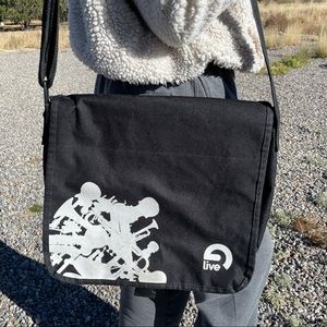 Black computer bag. Musical design.